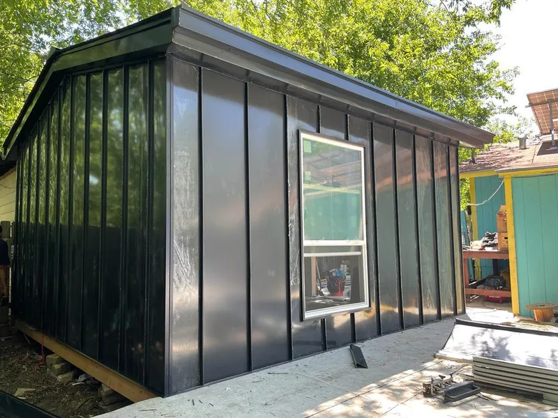 Black standing seam metal wall panels for Roof Inspection in Crown Point