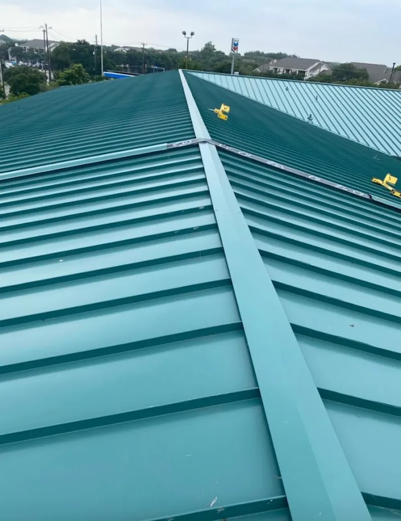 Green commercial metal roof ridge and valley for Metal Roof Repair in Crown Point