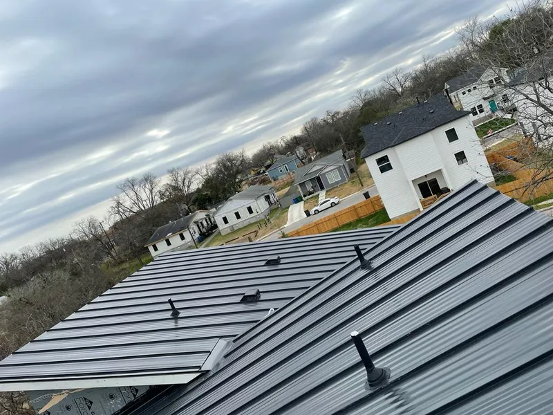 Standing seam metal roof panels with vents for Skylight Repair in Crown Point